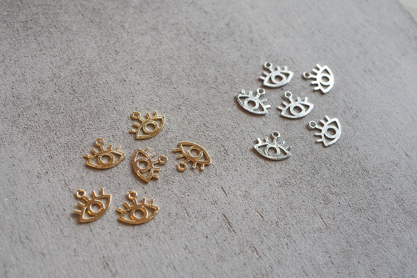 10 Augen Anhänger aus Messing, echt vergoldet / platiniert, 11mm x 13mm, Schmuckzubehör