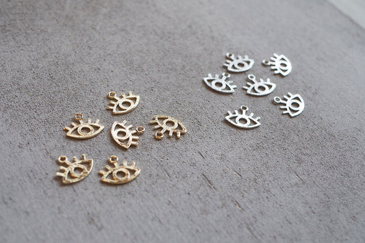 10 Augen Anhänger aus Messing, echt vergoldet / platiniert, 11mm x 13mm, Schmuckzubehör