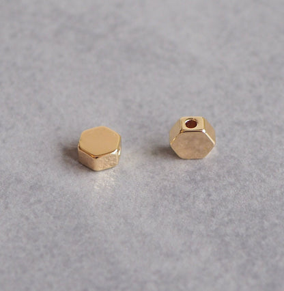 10 Stk. sechseckige Perlen aus Messing, 18 Karat echt vergoldet, 7mm, Spacer Perle Metallperle Sechseck Zwischenperle Gold Schmuckzubehör
